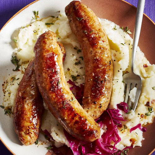 Clear plastic container of Panache Sweet Italian Turkey Sausage with a purple Panache label