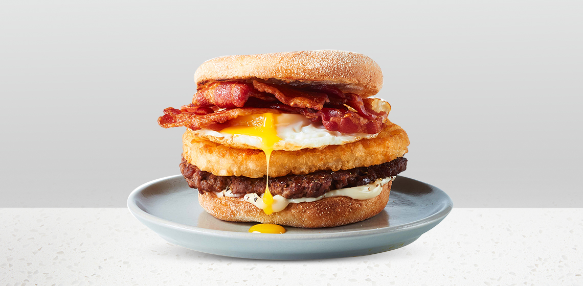 Best Brunch Burger: English muffin or brioche bun, smash burger patty, fried egg, hash browns, bacon, and maple syrup drizzle.