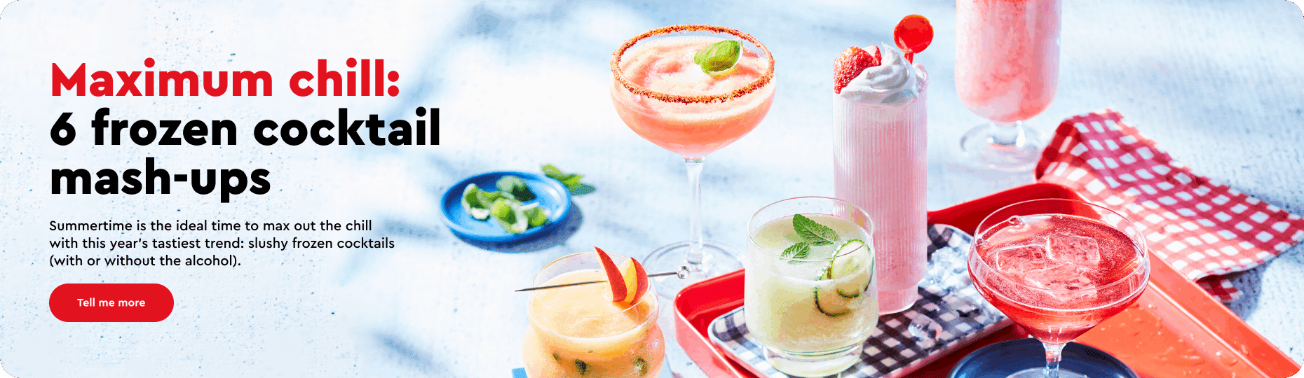 Marbled surface with a red serving tray of slushy frozen cocktails, including whipped strawberry lemonade, slushy dirty shirley, slushy gin gimlet and slushy watermelon beergarita.