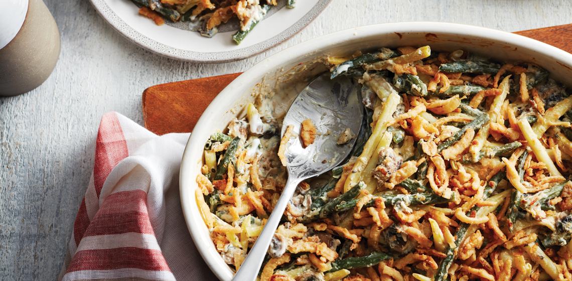 rectangular casserole dish of crispy onion-topped green bean casserole